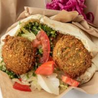Falafel Pita · Hummus( made in house sprouted garbanzo, , Lettuce, tomato, Tahini sauce on the side. 
* ask...