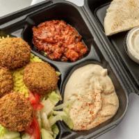 Falafel Plate · Served with salad, rice, 1 pita, and 2 sides. Falafel Mix is made in house FRESH Daily!.