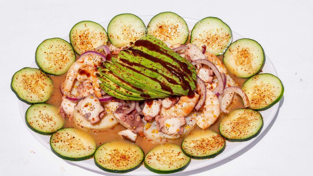 Special · Cooked shrimp, shrimp cured in lime juice, octopus, scallops, slices cucumber,  red onion, avocado and our delicious salsa negra.