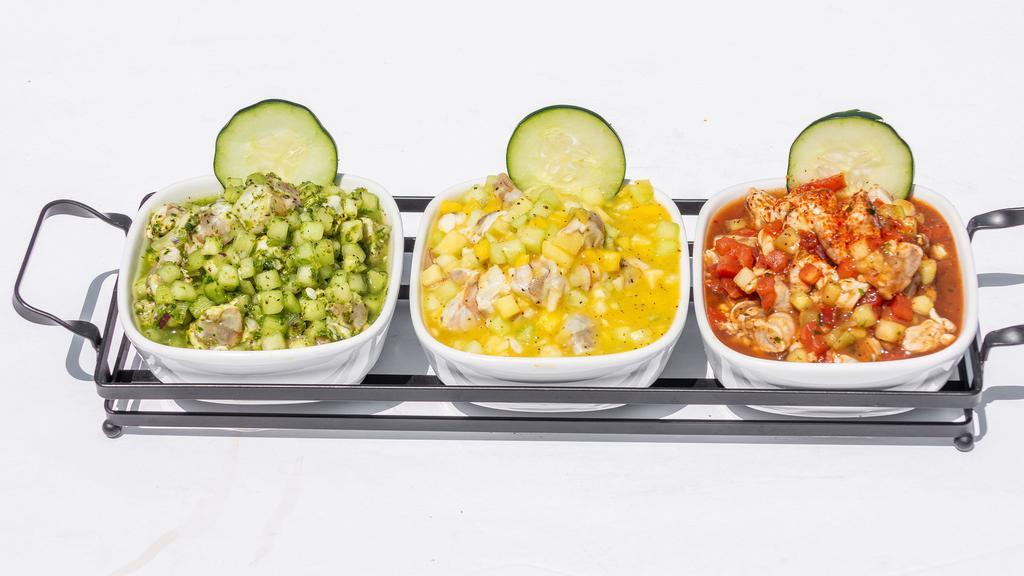 Ceviche Trio · Shrimp cooked in lime juice in three different styles (Altata style, black sauce ceviche and hulk).