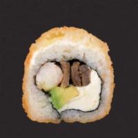 Tres Quesos Roll · In: Philadelphia, avocado, shrimp, and beef out: Philadelphia, melted monterey, and American...