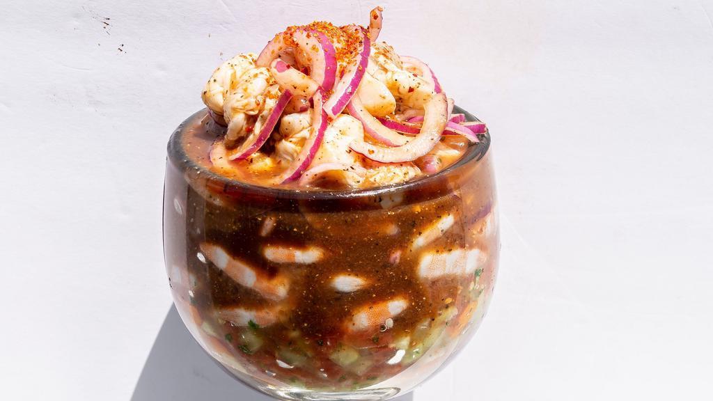 Campechana · Shrimp, octopus, scallops in aguachile sauce.