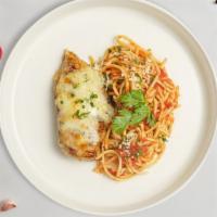 Chicken Parm Pasta · Freshly baked chicken parmesan served with rossa (red) sauce spaghetti and drizzled with par...