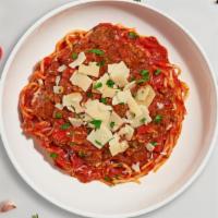 Spaghetti Bolognese · Fresh spaghetti served with a meaty red sauce and your choice of toppings.