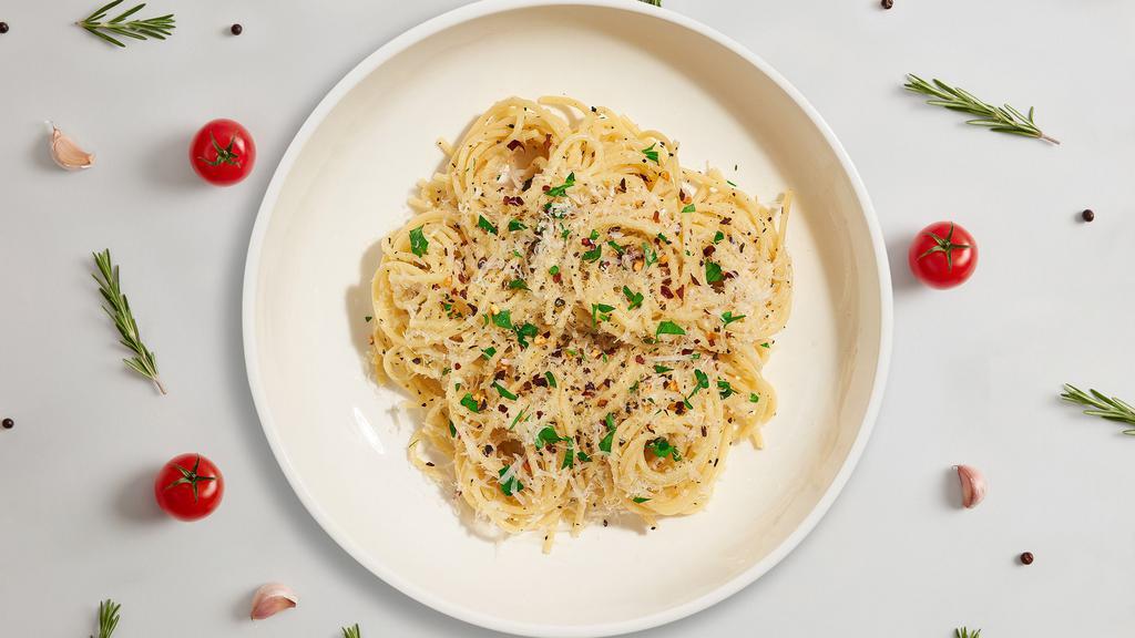 Spaghetti Garlic Butter · Italian classic spaghetti served with a golden garlic butter and olive oil sauce.