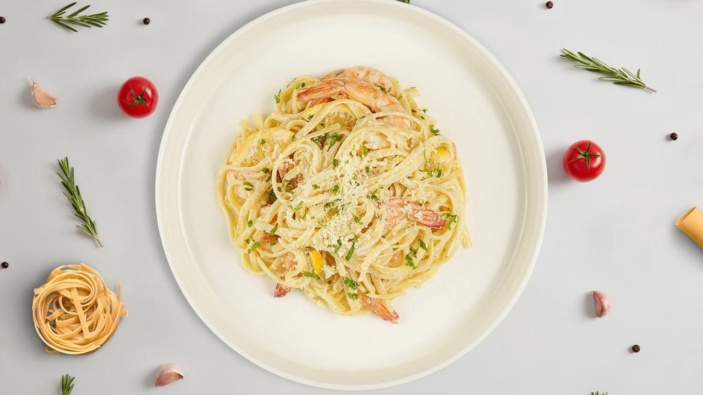 Linguine Shrimp · Linguine served with a creamy white sauce with shrimp, white wine, lemon juice, red pepper flakes, cherry tomatoes, and baby kale.