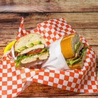 The Cali · Seasoned chicken breast, thick cut bacon, avocado, lettuce, tomato, served on a hoagie roll ...