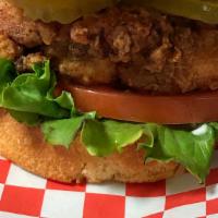 Fried Chicken Sandwich · Hand Breaded Chicken, on toasted Brioche Bun, with pickles and your choice of aioli.