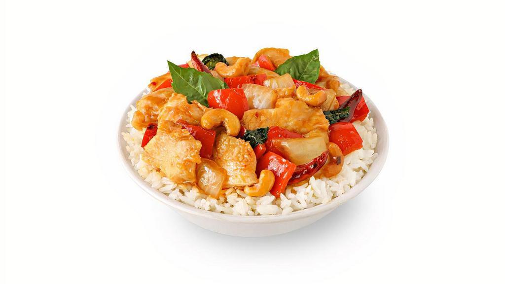 Thai Basil Cashew Chicken · With white onions, red bell peppers, fresh basil & chili peppers wok’d in our savory sweet & mildly spicy cashew sauce..