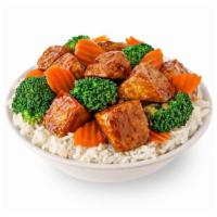 Teriyaki Tofu · Crispy Tofu with broccoli and carrots in a sweet soy teriyaki sauce.