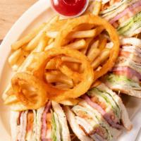 Club Sandwich Combo · Served with French Fries and a Medium Soft Drink