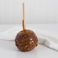 Apple Pie Caramel Apple · A granny smith apple covered in fresh caramel then dipped in white confection and rolled in ...