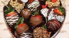One Dozen Dipped Strawberries · 12 strawberries dipped in milk, dark or white chocolate packaged in box with bow