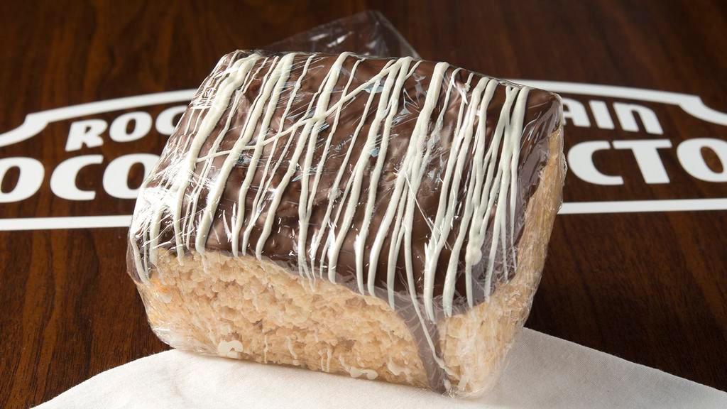 Chocolate Dipped Rice Krispie Treat · Rick Krispie treat dipped in rich milk chocolate drizzled with white confection.