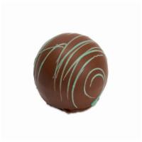 Mint Truffle · Cool and creamy milk chocolate peppermint center in a rich milk chocolate shell.
