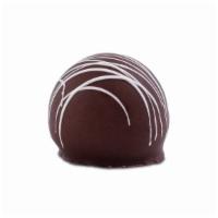 Iced Cappuccino Truffle · Cappuccino flavored half milk, half dark chocolate center in a dark chocolate shell with whi...