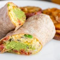 Authentic Mexican Burrito · Sautéed tomatoes, cheddar cheese, onion, jalapeños, guacamole, and bell pepper.