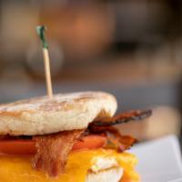 Egg Muffin · One egg, real or mock bacon, or real ham, tomato, and mixed cheddar cheese.