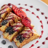 Stuffed French Toast · Classic French Toast Stuffed with cream cheese, blueberries, strawberries and drizzled with ...
