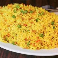 Vegetable Biryani · Basmati rice sauted with veggies and spices.