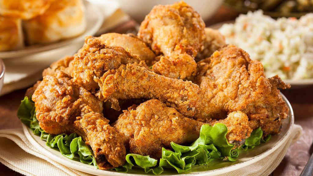 Fried Chicken Legs · (Eight pieces) marinated then coated in a garlic pepper seasoning and fried golden