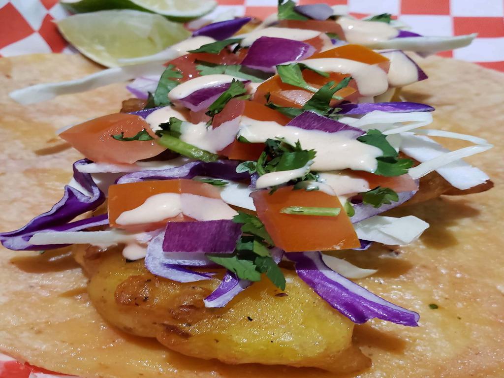 Baja Shrimp Taco · Beer battered shrimp, pico de gallo, cabbage, house sauce.