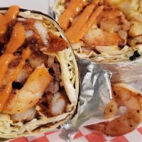 Wacky Shrimp Burrito · Grilled shrimp, sautéed pico de gallo, melted cheese, fries, cabbage, house sauce.
