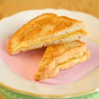 Grilled Cheese · Follow Your Heart brand provolone cheese on buttery millet toast.
