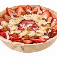Dragon Fruit Bowl · • Base:  Dragon fruit.. • Toppings:  Almond granola, banana, strawberries, coconut flakes, f...