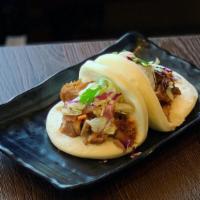 Pork Buns (2) · Soft steamed buns with chashu pork with spicy savory sauce.