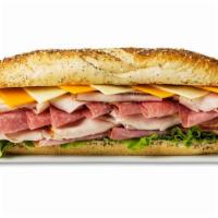 Everything Sub Sandwich  · Ham, turkey salami, pepper turkey and cheese on everything seasoning French bread.