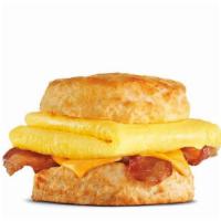 Bacon Egg & Cheese Biscuit · Crispy bacon, folded egg and American cheese on a buttermilk biscuit.. Breakfast served unti...