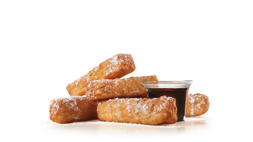 French Toast Dips® · 5-piece French Toast Sticks, sweetly sprinkled with powdered sugar, served with a side of syrup.. Breakfast served until *10:30am (*Hours may vary by day)