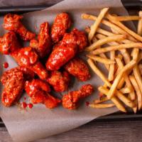 20 Wing Combo · 20 antibiotic free wings fried to a crisp, with your choice of two flavors, one side, two dr...