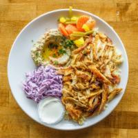 Chicken Shawarma · Thinly sliced shaved marinated chicken with our house spices.