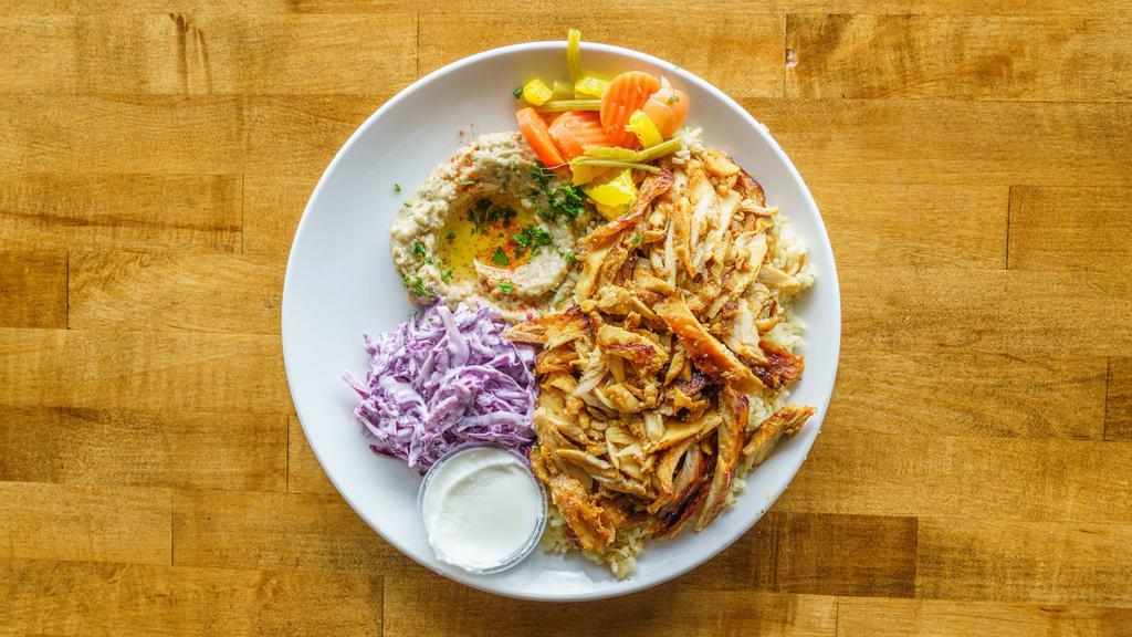 Chicken Shawarma · Thinly sliced shaved marinated chicken with our house spices.