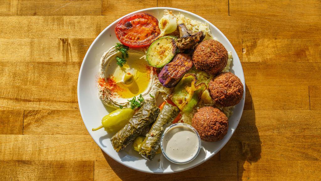 Veggie Entree · Grilled bell peppers, tomatoes, eggplant, zucchini, mushrooms and onions along with three pieces of falafel.