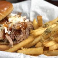 Pulled Pork Sammich · Our Championship winning Pulled Pork on a butter toasted brioche bun, topped with our homema...