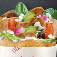 Gyro Pita · Seasoned strips of lamb and beef, spinach, tomatoes, cucumbers, onions, black olives, feta, ...
