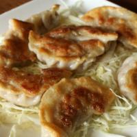 Steamed Or Pan-Fried Chicken Potsticker (8) · Minced ground chicken mixed with green onions wrapped in a potsticker