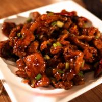 Crispy Orange Chicken · Spicy. Lightly battered white meat chicken breast blended with chili peppers,
green onions, ...