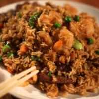House Special Fried Rice · Large shrimp, white meat chicken breast, sliced beef, carrots, peas, and onions
mixed with e...