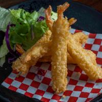Deep Fried Shrimp (7) · Deep-fried shrimp with house made lemon cream sauce.