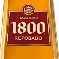 1800 Reposado  · Aged in French and American oak barrels, notes of butter, spice, and a hint of smoke.