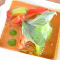 Panang Curry · Spicy. Choice of meat along with cooked string bean, bamboo shoots and lime leaves in Thai t...