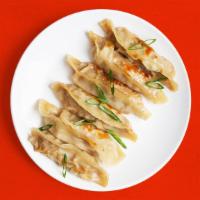 Fried Vegetable Dumplings · 6 fried dumplings filled with mixed vegetables.