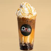 Layered Caramel Macchiato · Espresso, milk, caramel flavor and caramel drizzle layered together in an iced drink