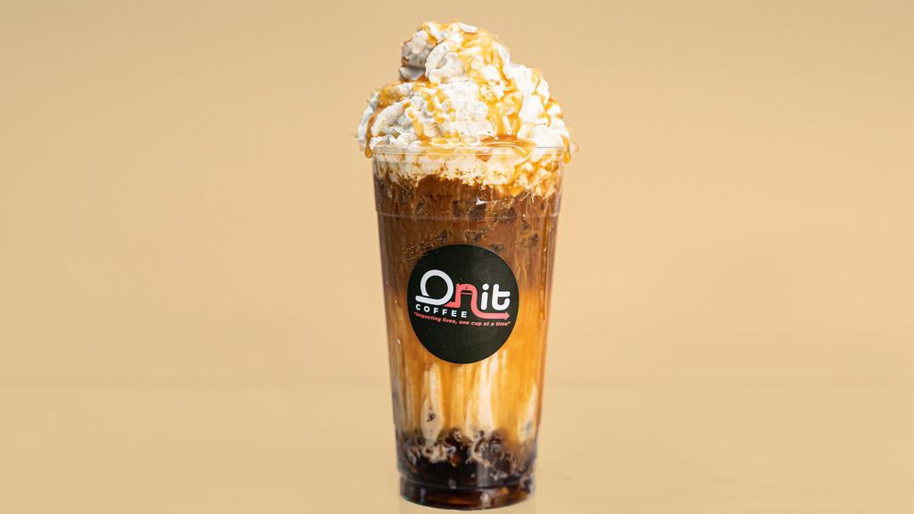 Layered Caramel Macchiato · Espresso, milk, caramel flavor and caramel drizzle layered together in an iced drink