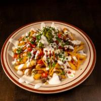 Asada Fries · beans, pico de gallo,sour cream, guacamole &cheese