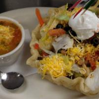 Poco Taco Salad & Tortilla Soup · Taco salad made mini with a flour tortilla shell filled with crisp salad greens, tossed in s...